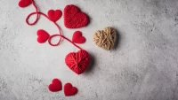 red-yarn-heart-shaped-wall-background_1150-6963